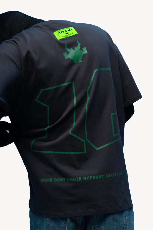 Back view of model wearing HYPGOAT grey oversized t shirt – shows No. 10 graphic