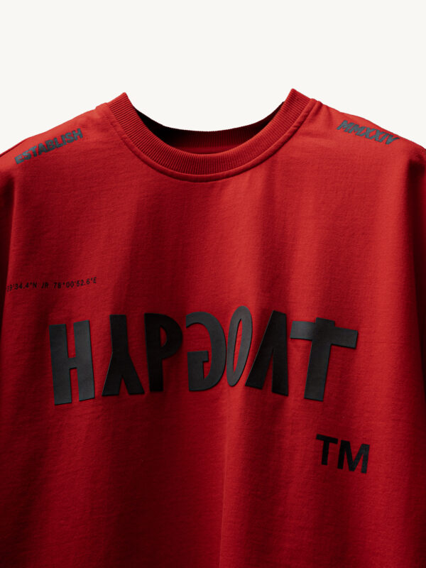 Close-up detailing of HYPGOAT Red Basic T-Shirt fabric.